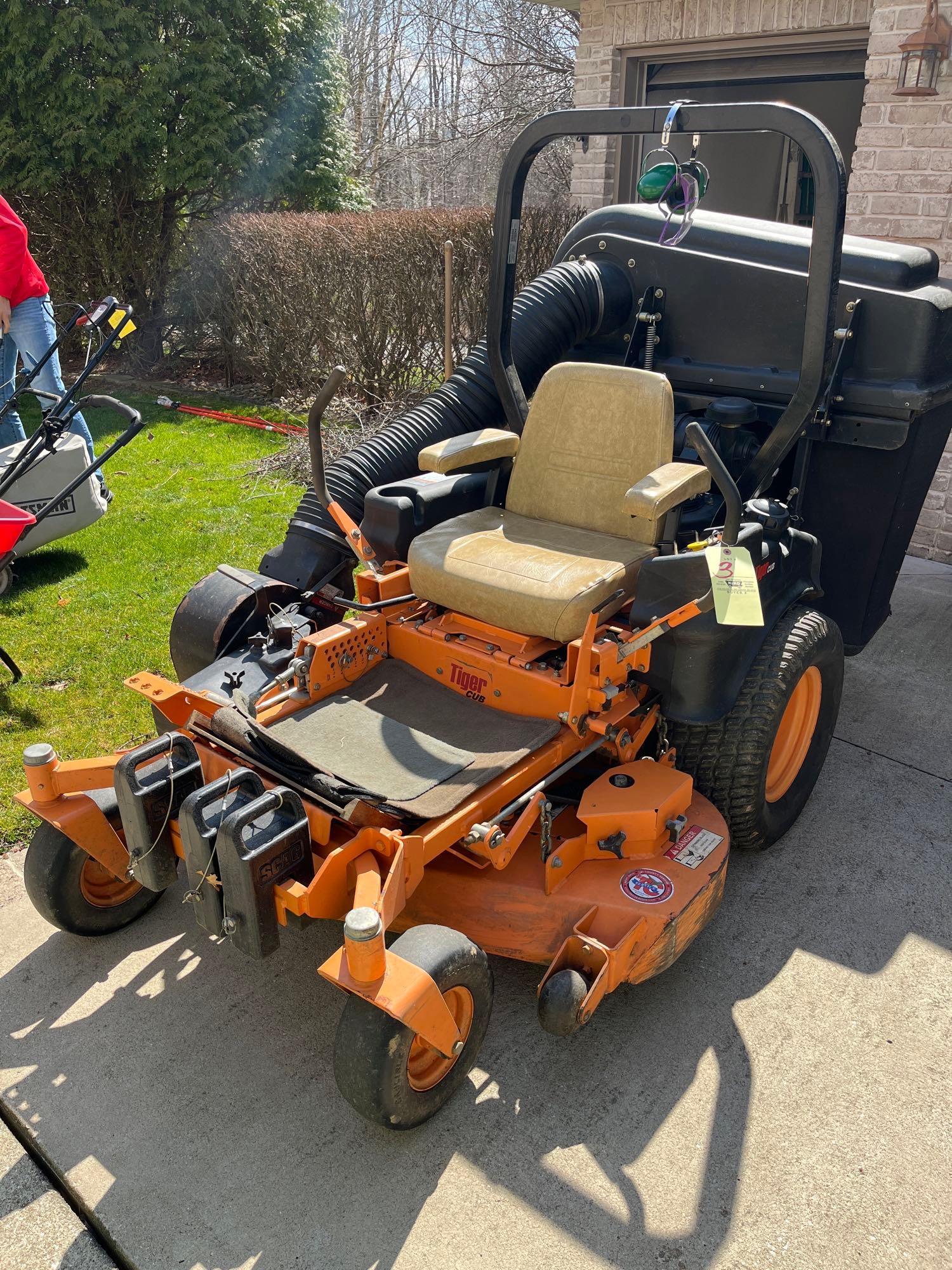 Scag Tiger Cub zero turn mower with bagger, front Proxibid