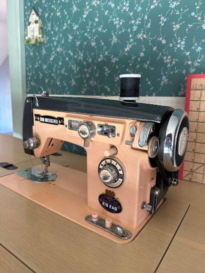 early, Good Housekeeper sewing machine w/accessories