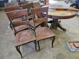Oak clawfoot table with 6 chairs, rough