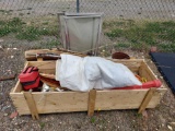 fishing poles, cooler, box of boat items