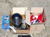 motorcycle helmet, American flag, battery, camping items