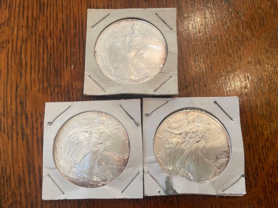 (3) 2010 walking liberty silver dollars