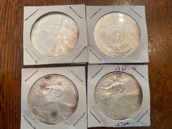 (4) walking liberty silver dollars