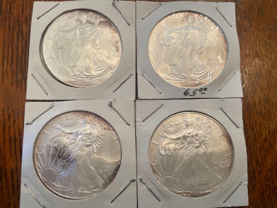 (4) walking liberty silver dollars