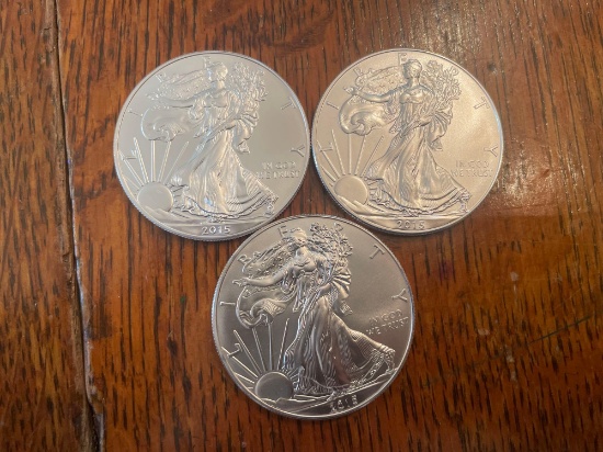 (3) walking liberty silver dollars