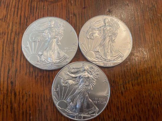 (3) walking liberty silver dollars