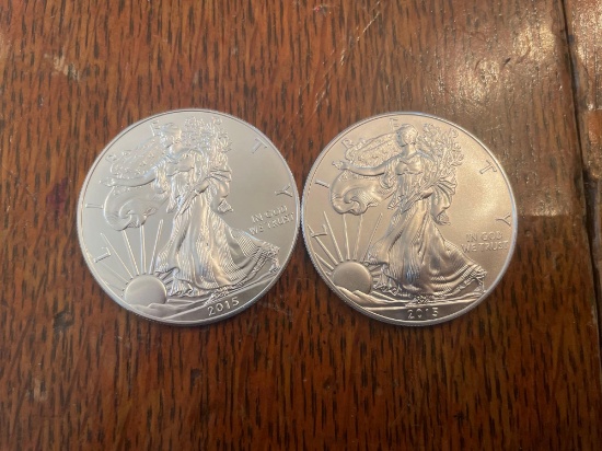 (2) walking liberty silver dollars
