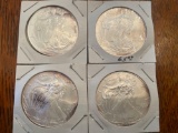 (4) walking liberty silver dollars