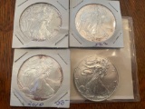 (4) walking liberty silver dollars
