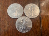 (3) walking liberty silver dollars