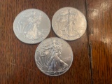 (3) walking liberty silver dollars