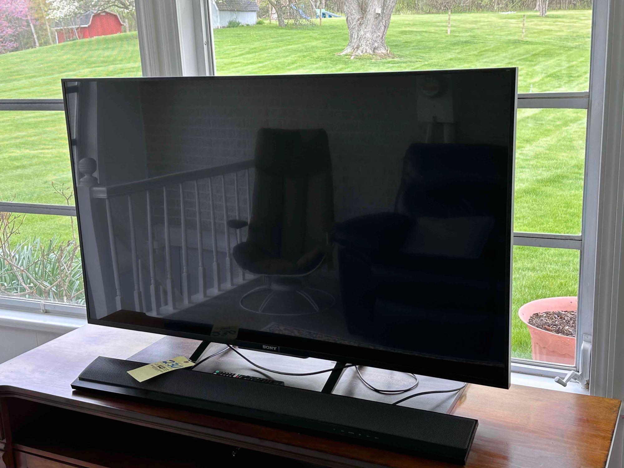 Sony 55in flatscreen TV and sound bar and sub Proxibid