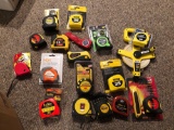 Tape measures, mostly new.