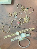 Costume Jewelry including several men and ladies watches, small pocket knives