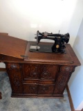 Singer Sewing Machine with Ornate Quarter Sawn Oak Cabinet