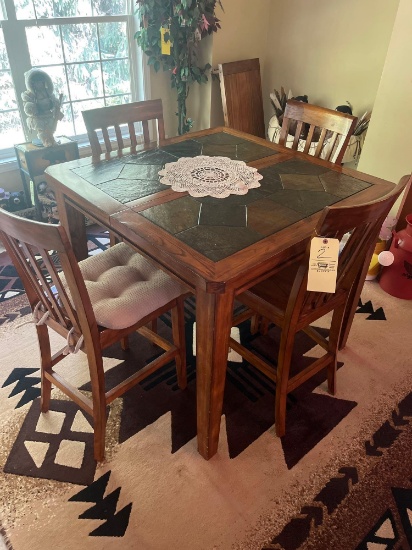 Wooden table with 4 chairs and extra leaf