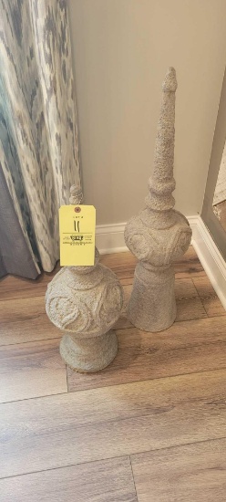 Pair of composition finial statues, largest 31 inches tall