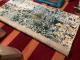 Blue Rug Minor Damage Unraveling In Picture