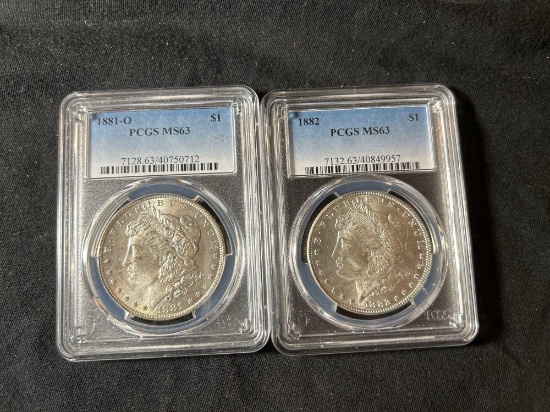 (2) PCGS MS 63 Morgan silver dollars