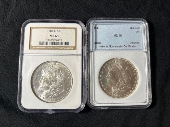 (2) 1884-o & 1889 Morgan silver dollars