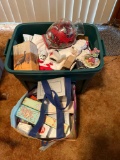 tote of Christmas decor, Avon bottles