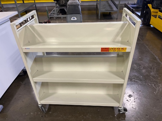 metal bookshelf on casters