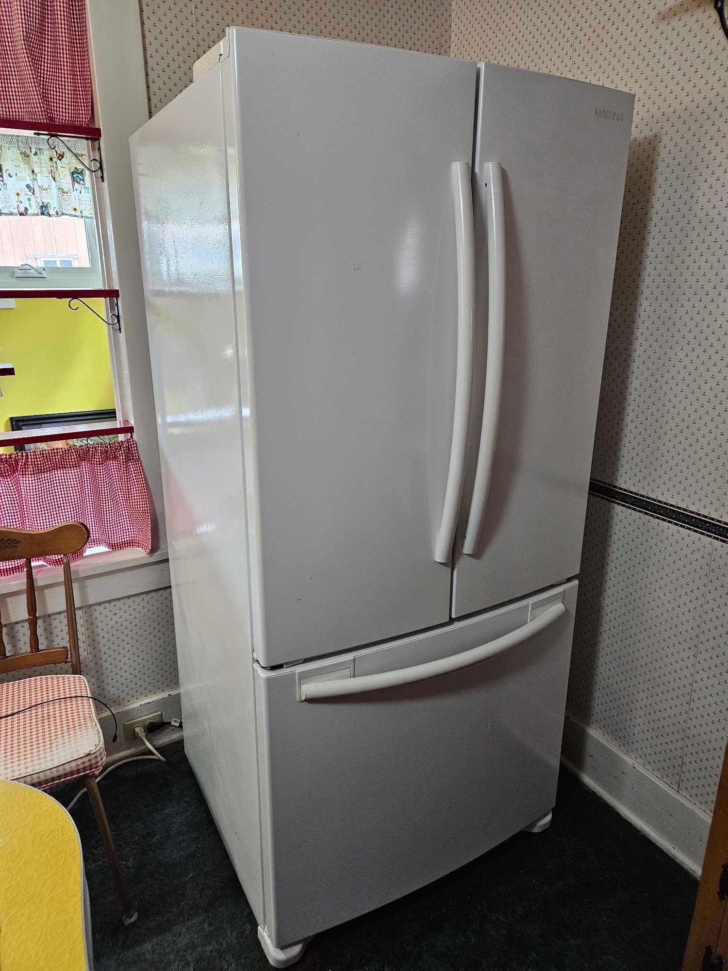 Samsung Model RF217 3 door refrigerator with Proxibid