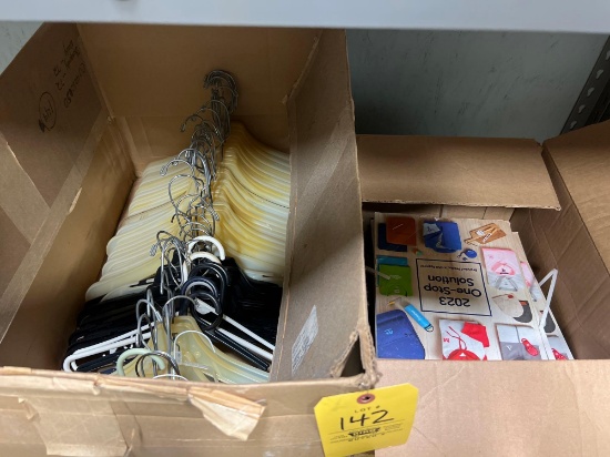 Box of Hangers and Catalogs