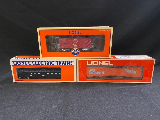 (2) Lionel O Gauge Freight Cars & NYC Caboose
