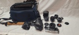 Minolta SRT201 35mm film camera with 50mm 1:1.7 lense, extra lenses and bag