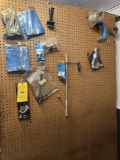 Contents of 2 Pegwall Racks - Removers, Installers, Adapters, Locking Tools, & Other Specialty