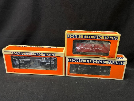 (3) Lionel Assorted Cabooses, and Hopper