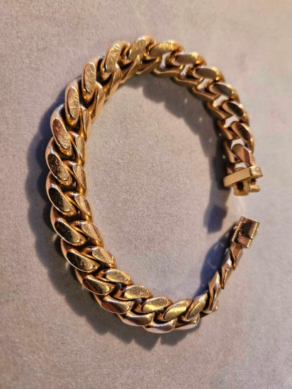 Man's 14k yellow gold heavy curb bracelet