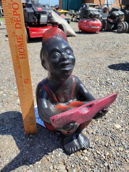 Man eating statue