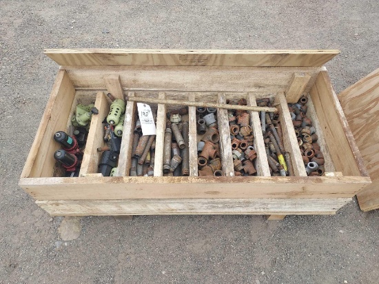 Wooden crate of assorted hardware, pipe fittings, ubricators.
