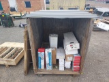 Large wooden crate of Catalytic Converters and muffler parts.