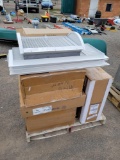 Pallet of air dampers and vents.