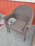 Two outdoor wicker chairs.