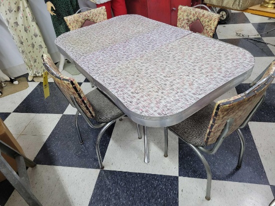 Unusual MCM retro style chrome table with leaf and 4 chairs