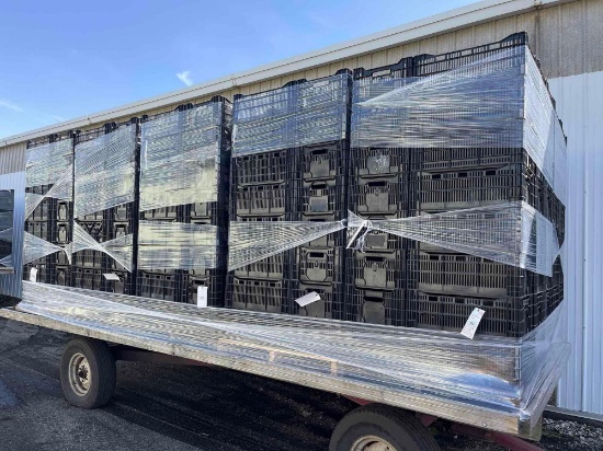 40 plastic produce bins on a pallet