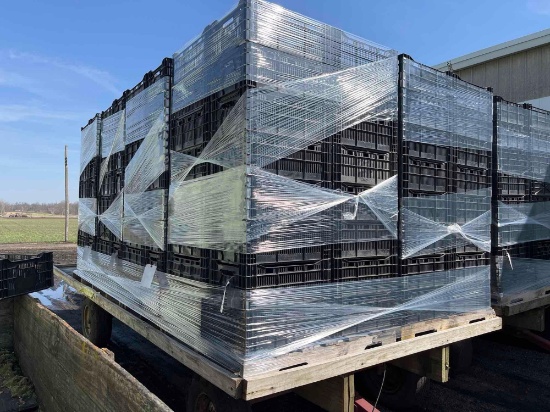 40 plastic produce bins on a pallet