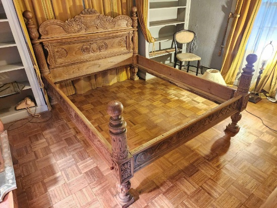 Ornately carved bed frame, antique