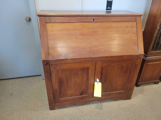 Antique slant front desk with 2 doors and pigeon hole organizer