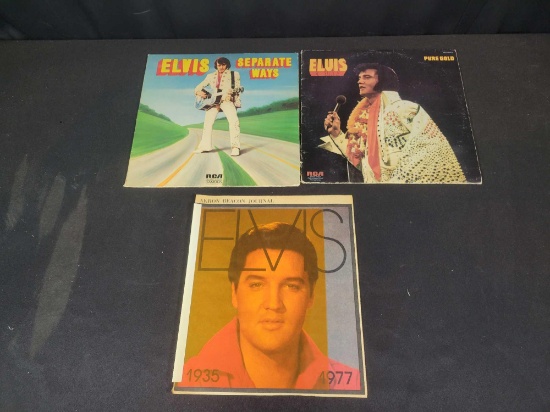 2 Elvis Presley record albums and paper items