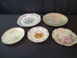 Antique handpainted platters and assorted charger