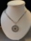 Lady's 14k white gold round pendant