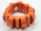 Chunky orange plastic expandable bracelet