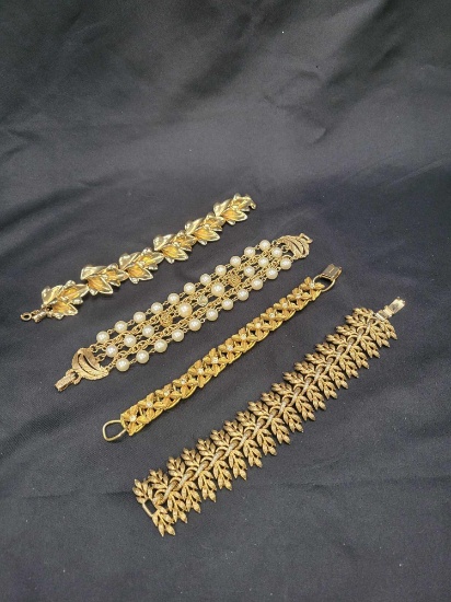 Vintage gold tone costume jewelry bracelets, Florenza and Lisner pieces