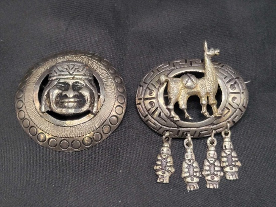 Peruvian style silver Alpaca and figure brooches