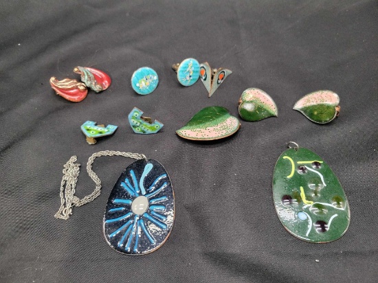 Lot of vintage enameled costume jewelry, pendants, earrings and cuff links